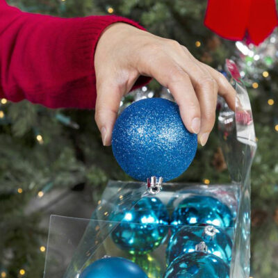 Tips for deciding if a Santa tree topper is right for your tree